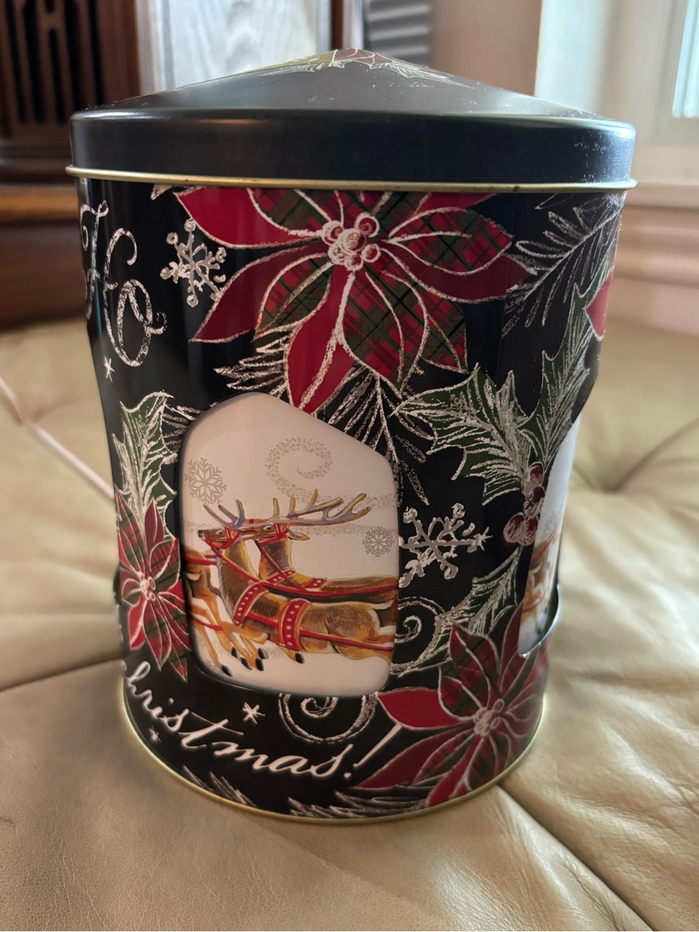 Pier 1 Musical Black and Red Poinsettia Holiday Tin with Reindeer Scene